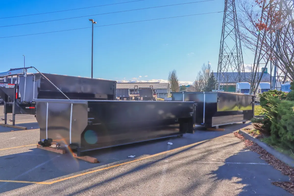 Roll-off dumpster ready for waste disposal at job site for Demolition Dumpster Rental in North Syracuse